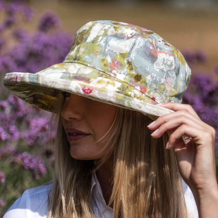 Sun hat with flowery bow and UV protection - order now