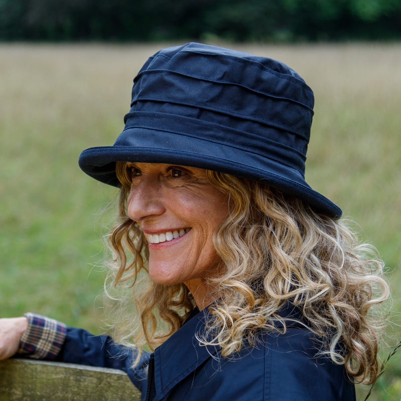 womans peak and brim navy waxed hat